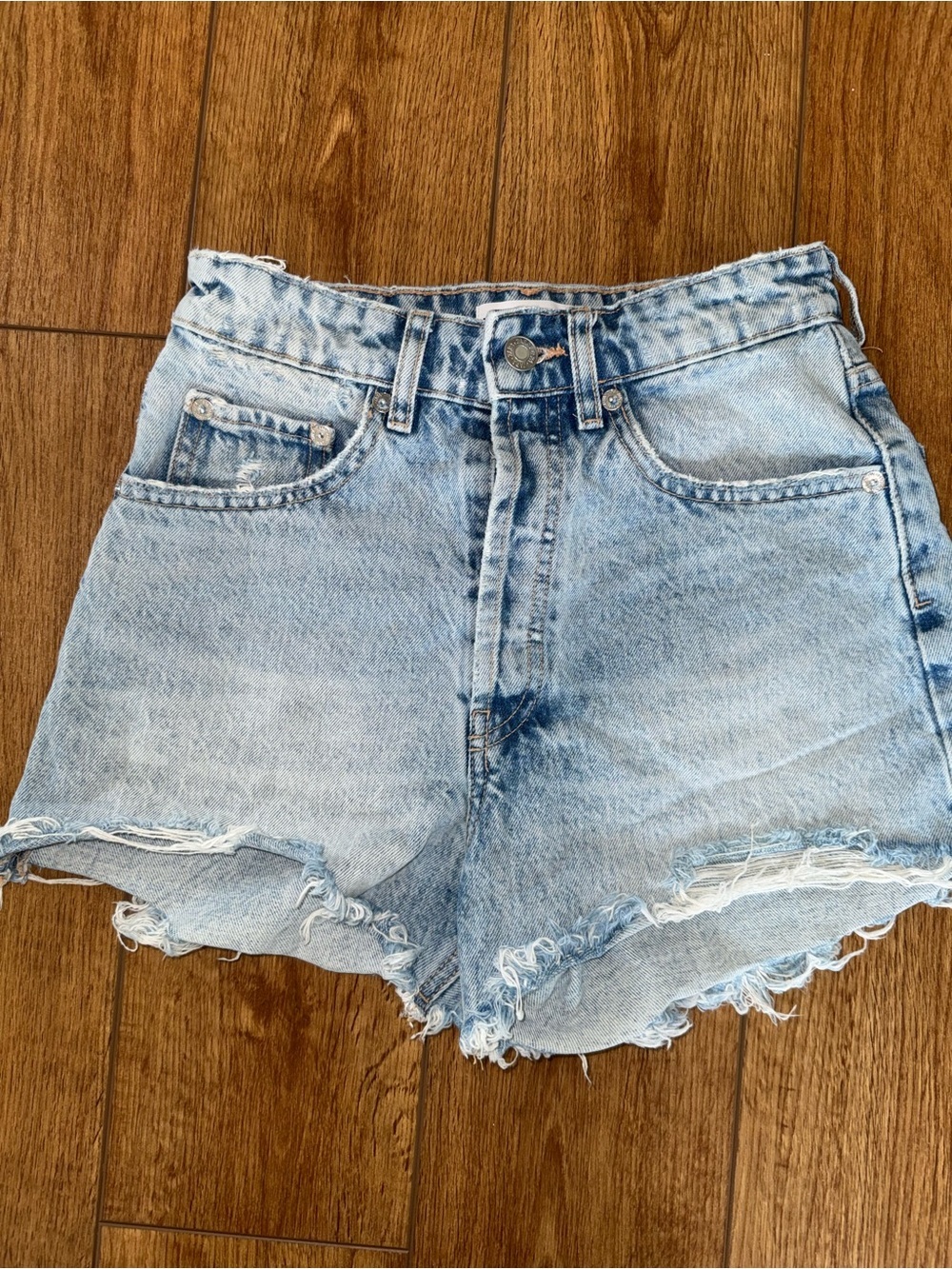 Zara light wash high rise Denim shorts frayed hems Size 2